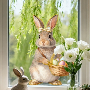 Detail of Easter bunny window sticker with eggs and floral bow on glass background