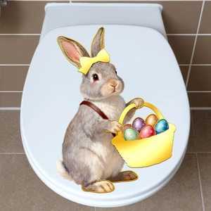Easter bunny and colorful egg basket decal applied on a white toilet lid in a bathroom