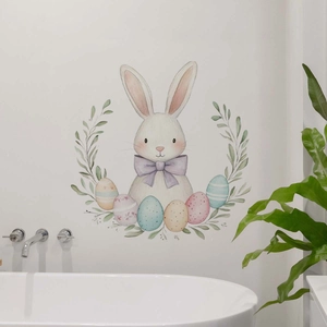 Watercolor Easter bunny wall decal with colorful eggs above a modern white bathtub