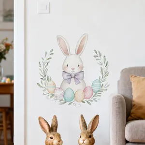 Detail of watercolor Easter bunny wall sticker with eggs and floral wreath decor