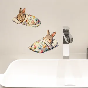 Detail van aquarel konijn muurstickers op badkamerwand bij een chromen kraan