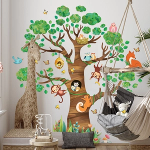 Detailed wall sticker layout featuring a cartoon tree and safari animals in a nursery room