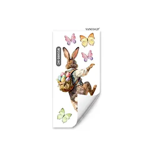 Detalle de vinilo decorativo de conejo de Pascua con huevos en acuarela y mariposas de colores