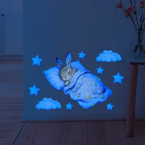 Luminous Easter bunny wall sticker with glowing stars and blue clouds for kids' bedrooms