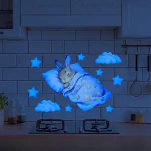 Luminous Easter bunny sleeping under egg blanket on blue night wall decal for bedroom decor