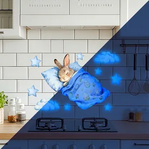 Luminous blue Easter bunny wall sticker showing daytime and nighttime glowing effect