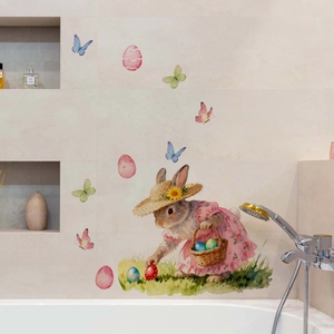 Detail view of watercolor Easter bunny and colorful eggs wall stickers on bathroom tiles