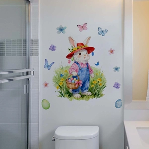 Detail of watercolor Easter bunny wall sticker on a clean white bathroom wall background