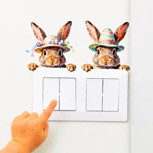 Creatieve Paashaas lichtschakelaar stickers met gekleurde eieren in woonkamer