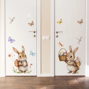 Detailed view of watercolor Easter bunny and egg wall stickers on white bedroom doors