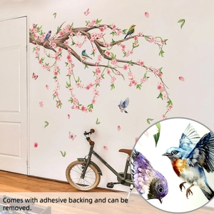 Pink cherry blossom branch wall decals with colorful birds and butterflies for home decor