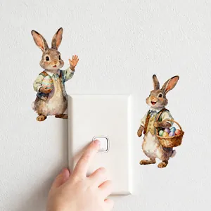 Paashaas muursticker toont schaal naast lichtschakelaar in een huiselijke setting