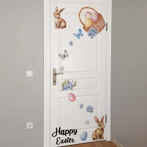 Easter wall stickers with rabbits and eggs on a white door for festive home decoration