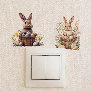 Detail van aquarel Paashaas muurstickers aangebracht naast een lichtschakelaar
