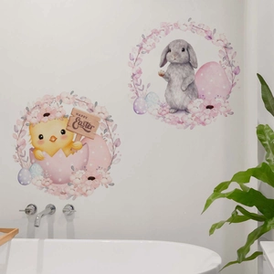Close-up of Easter wall stickers with watercolor bunny and chick above the bathtub