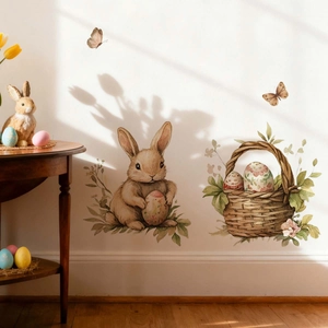 Detail of watercolor Easter bunny wall stickers with floral basket on a white wall