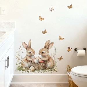 Easter wall decals featuring cartoon bunnies, colorful eggs, and butterflies on a white wall