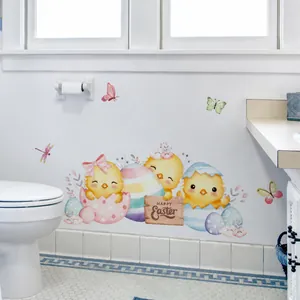 Easter wall sticker with yellow chicks and eggs on a white bathroom tile background