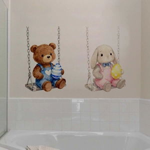 Detailed wall sticker showing a watercolor bear and bunny on swings for Easter decor