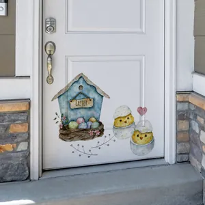 Detail of watercolor Easter door decal featuring birdhouse and chicks on white door