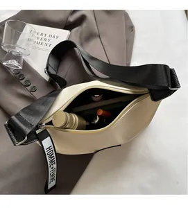 Top view of lychee pattern moon bag showing spacious interior with nylon wide strap