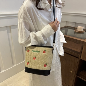 Fashionable straw bucket bag with strawberry embroidery and adjustable shoulder strap