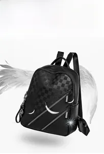 Detail of lightweight black leather backpack with checkered pattern and 0.53kg weight mark