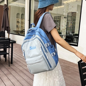 Minimalist blue and grey large capacity color-block backpack with Sulu brand lettering