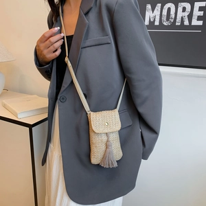 Woven straw mini crossbody phone bag with fringe tassel and gold button closure