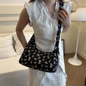 Japanese minimalist black canvas shoulder bag with white bow pattern floral print