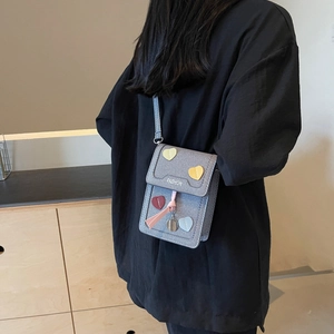 Chic gray fabric crossbody phone bag with colorful heart patches and fashion print