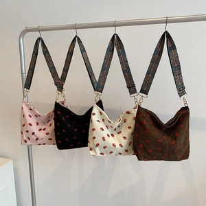 Corduroy tote bag with strawberry embroidery and boho strap in four stylish colors