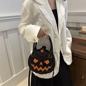 Fashionable Halloween pumpkin crossbody bag with orange spider web embroidery on black leather
