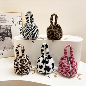 Faux fur animal print bucket bags with drawstring and gold chain strap in five patterns
