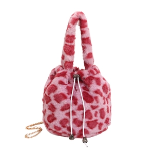 Chic pink leopard print faux fur bucket bag with a gold chain strap for women