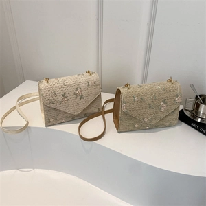 Straw woven envelope bag with pink flower embroidery and chain strap in two colors