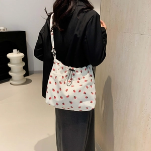 Minimalist white corduroy crossbody bag with cute red strawberry print and drawstring