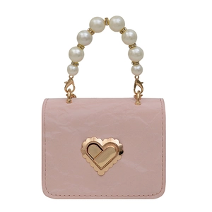 Pink mini square handbag with pearl handle and golden heart lock for women