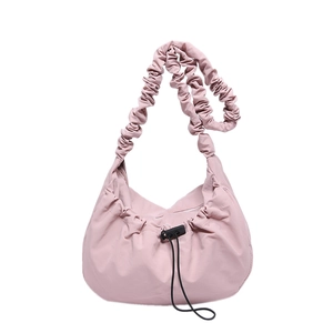 Pink drawstring nylon shoulder bag with pleated ruffled strap and spacious cloud design