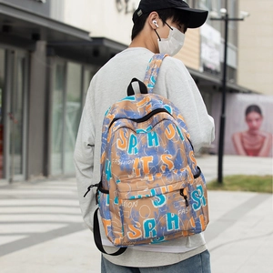 Graffiti printed large capacity backpack with fashion cartoon patterns and street style