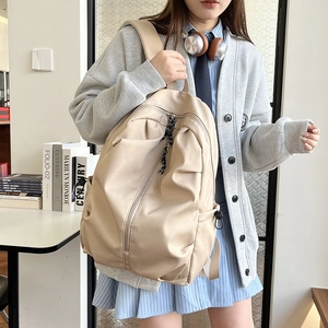 Minimalist beige nylon backpack with multi-compartments for students in casual school style