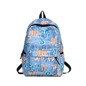 Minimalist blue travel backpack featuring colorful graffiti letters and a large capacity