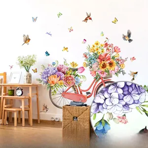 Close-up of red vintage bicycle flower wall sticker with detailed butterfly and bird patterns