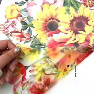 Close-up showing the self-adhesive backing and removable feature of floral wall stickers