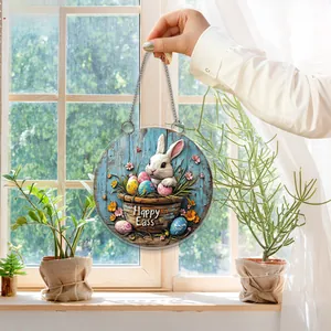 Easter bunny and colorful eggs door sign plaque hanging on a sunlit window