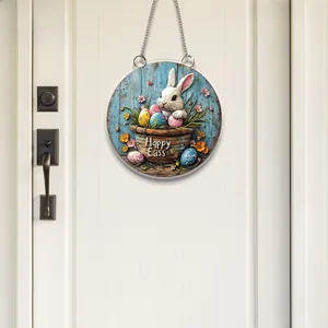 Detailed close-up of 2D acrylic Easter bunny egg pendant on a blue wood texture background