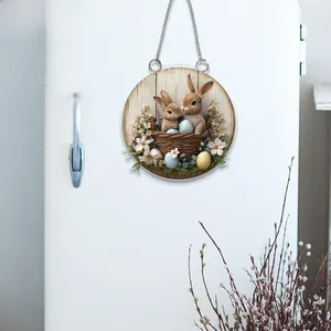 Detailed 2D flat acrylic Easter bunny and eggs hanging ornament on a white fridge door