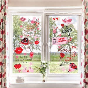 Valentijnsdag raamstickers met hartjes, cupido's en rozen op een heldere glasplaat