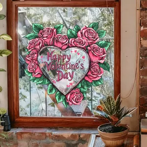Detail van hartvormige raamsticker met roze rozen en Happy Valentine's Day tekst op glas
