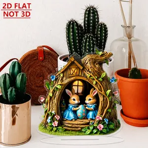 Close-up of a 2D acrylic Easter bunny stand with a tree house and painted egg design